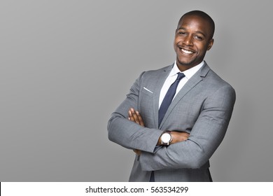 Attractive handsome happy smiling professional businessman executive with a stylish suit and tie