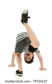 Attractive Happy Boy Doing Cartwheel On White Floor.