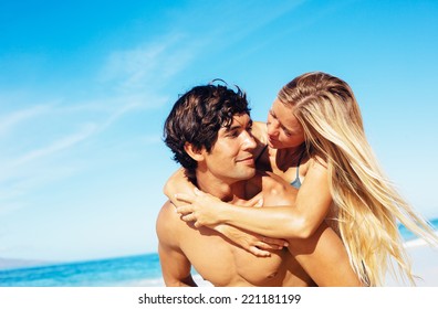 Attractive Happy Couple On Beautiful Sunny Beach 