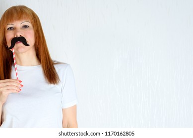 Attractive Happy Middle Aged Woman Having Fun With A Fake Moustache On Stick. Senior  Female In Period Menopause. Lifestyle, Women's Health Concept : Playful  Mature Ready For Party. Impostor Syndrome