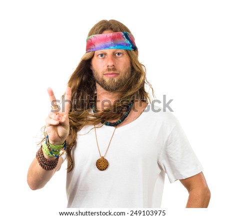 Attractive hippie giving a peace sign isolated on white
