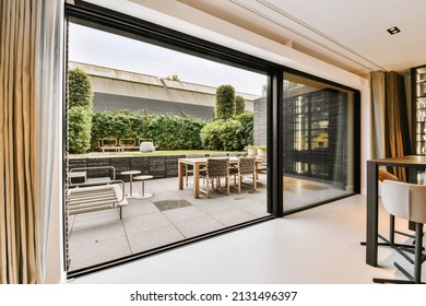 Attractive huge sliding glass door leading to the courtyard