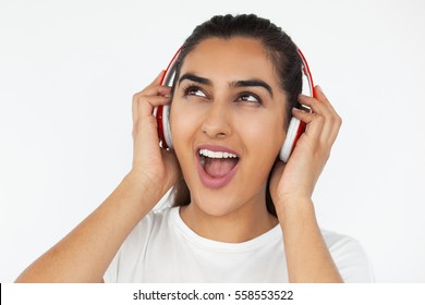 Attractive Indian Woman In Headphones Singing