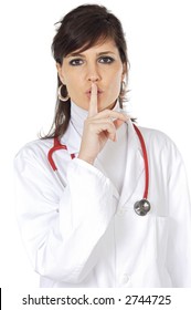 attractive lady doctor ordering silence over a white background