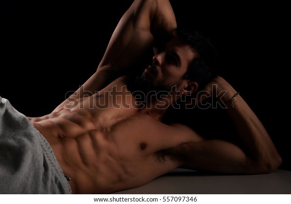 Attractive Male Model Lying Posing On Stock Photo Edit Now 557097346