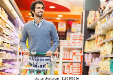 Attractive Man Shopping In A Supermarket