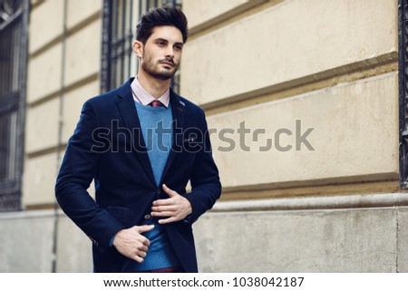 Similar – Attractive man in the street wearing british elegant suit