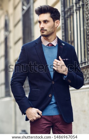 Similar – Thoughtful young man sitting on an urban bench