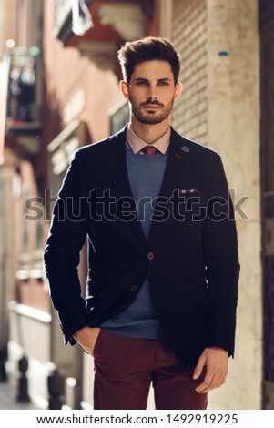 Similar – Attractive man in the street wearing british elegant suit