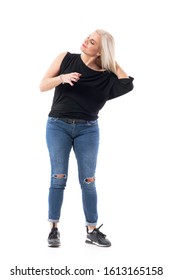 Attractive Middle Age Blond Hair Woman Getting Dressed Adjusting And Making Hairdo. Full Body Length Isolated On White Background. 