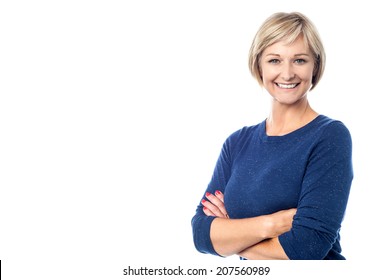 Attractive middle aged woman with folded arms