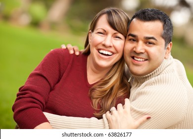 Attractive Mixed Race Couple Portrait In The Park.