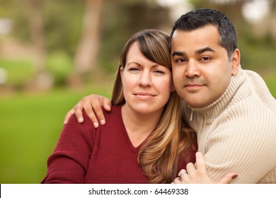 Attractive Mixed Race Couple Portrait In The Park.