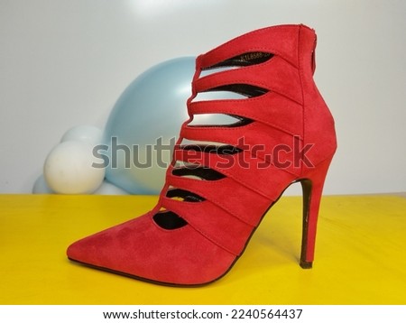 Attractive modern women's red high heel shoe