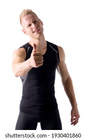 Attractive and muscular young man with thumb up doing OK sign, isolated on white