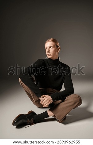 Similar – Image, Stock Photo Charming non binary looking through ring lamp near eyeshadow