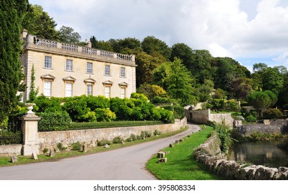 Attractive Old Mansion House And Driveway In The English Countryside