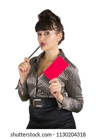 Attractive Older Business Woman Holding Little Red Book With Pen In Mouth. Posed Cliche Stern Sexy Office Worker. Isolated On White.