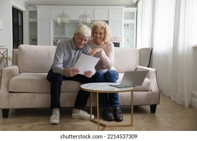 Attractive Older Couple Reading Received Formal Notification, Smiling Enjoy News, Feel Satisfied Look Happy, Get Mortgage Approval, Relish Financial Success, Investment And Profits, Pension Growth