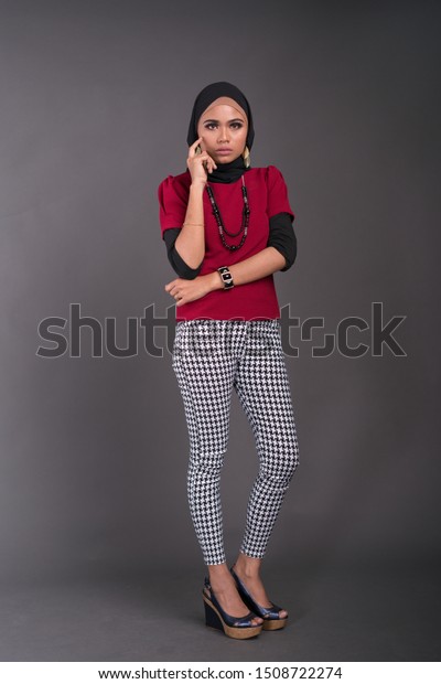 red shirt grey pants