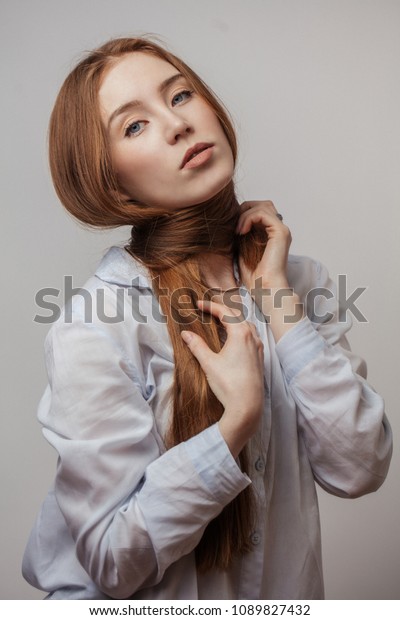 Attractive Redhaired Woman Tying Thick Ginger Stock Photo Edit