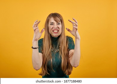 Attractive scowling angry, Head shot scowl, was offended gloomy eyebrows, Sulky, Waist-up portrait of beautiful face in displeasure, affront tensed, having bad mood, getting mad, frowning forehead - Shutterstock ID 1877188480