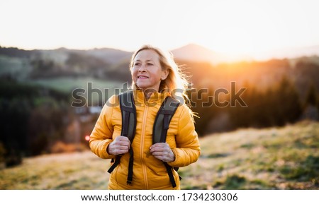 Similar – Image, Stock Photo beautiful caucasian woman walking with her cute brown poodle on the road. Pets and lifestyle outdoors