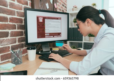 Attractive Seriously Business Worker Girl Using Credit Card Paying Ransom Solving Company Working Computer Getting Blackmail Virus Invision.