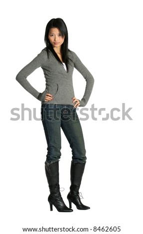 Attractive slim Asian woman dressed casually wearing boots