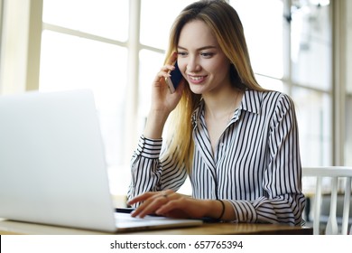 Attractive Smiling Hipster Girl Making Shopping Online In Web Store Confirming Booking Making Phone Call To Operator Service, Professional HR Manager Making Job Offer Having Mobile Conversation