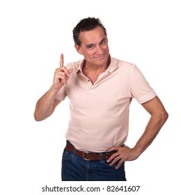 Attractive Smiling Middle Age Man Pointing Upwards or Wagging Finger with Cheeky Grin and Hand on Hip