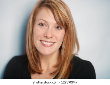 Attractive smiling woman closeup portrait