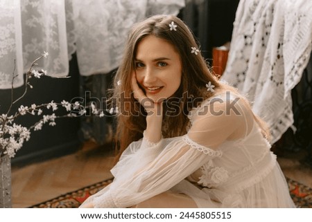 Attractive smiling woman with natural flawless skin, wearing trendy vintage style pastel dress. Spring, summer fashion, beauty concept