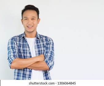 Attractive smiling young asian man with blue Casual Shirt look confident and handsome.