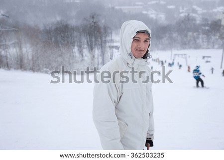 Similar – Skier from behind on the mountain