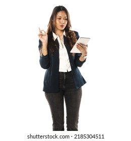 Attractive South East Asian Female Student With Her Portable Device On White Background