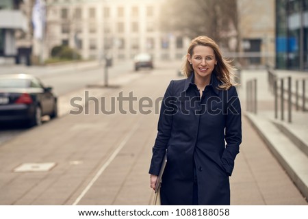 Similar – Attractive blond woman leaving her workplace