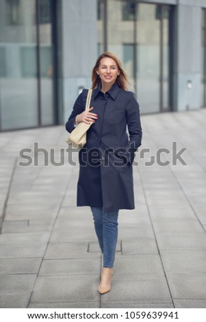 Similar – Attractive blond woman leaving her workplace