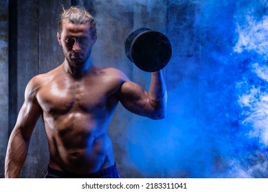 Attractive Tall Muscular Bodybuilder With Naked Torso Doing Exercises. Lifting Dumbbells For Bigger Biceps. Close Up Handsome Man With Big Biceps Lifting Weights. Fitness Center, Healsy Life Concept.