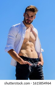 Attractive Torso. Hot Day Outdoors. Attractive Man Taking Off Shirt. Confident In His Appealing. Bearded Guy Business Style. Handsome Man Fashion Model. Muscular Torso. Muscular Sexy Macho Man.