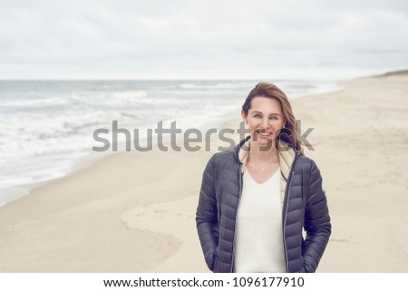 Similar – Pretty healthy woman enjoying a hike on a beach