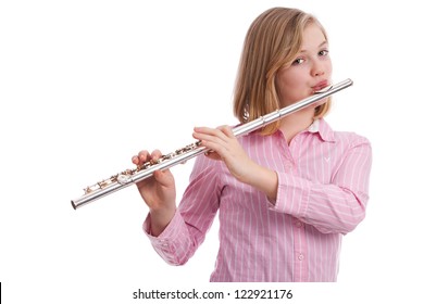 Attractive Tween Playing Her Flute.  Isolated On White.