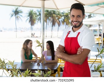 Attractive Waiter Of A Cocktail Bar At Beach