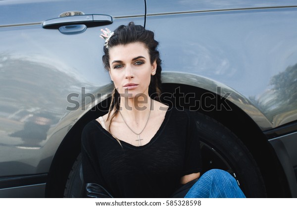 Attractive woman at the\
car