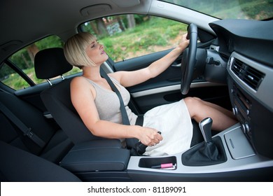 Attractive Woman In The Car Using Hand Brake On The Steep Hill