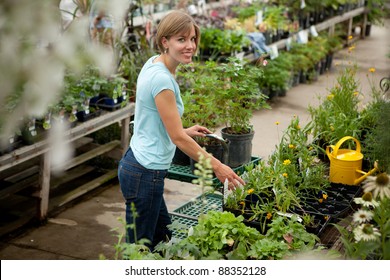 Attractive Woman In Garden Center