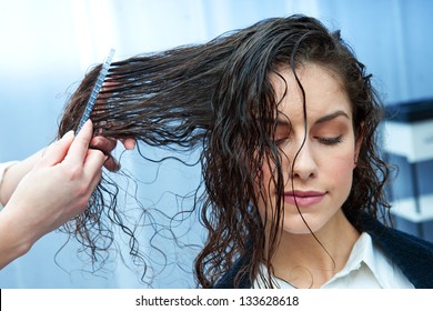 Attractive Woman In Hair Salon Making New Haircut