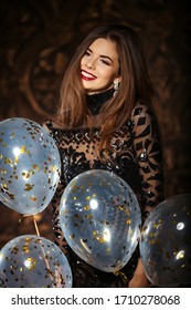 Attractive Woman Holding Baloons And Smiling, Party And Holiday Season Concept