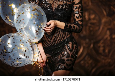 Attractive Woman Holding Baloons And Smiling, Party And Holiday Season Concept