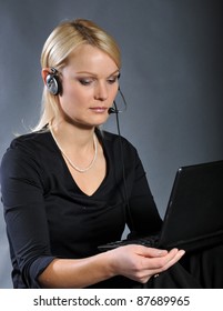 Attractive woman  with laptop ans accesories